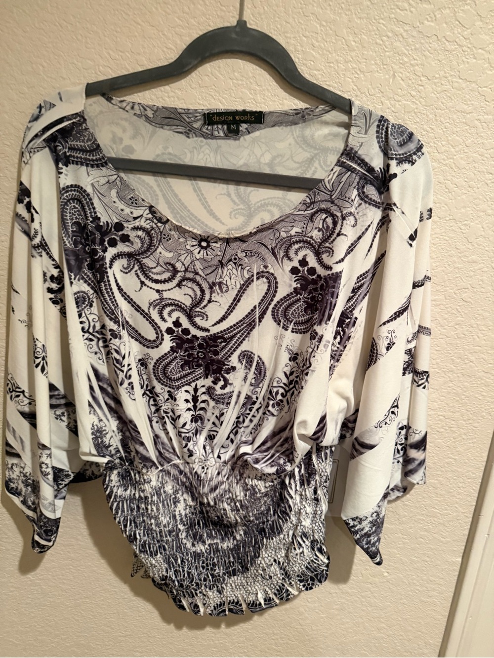 Beautiful black-and-white pattern pullover blouse by Design Works